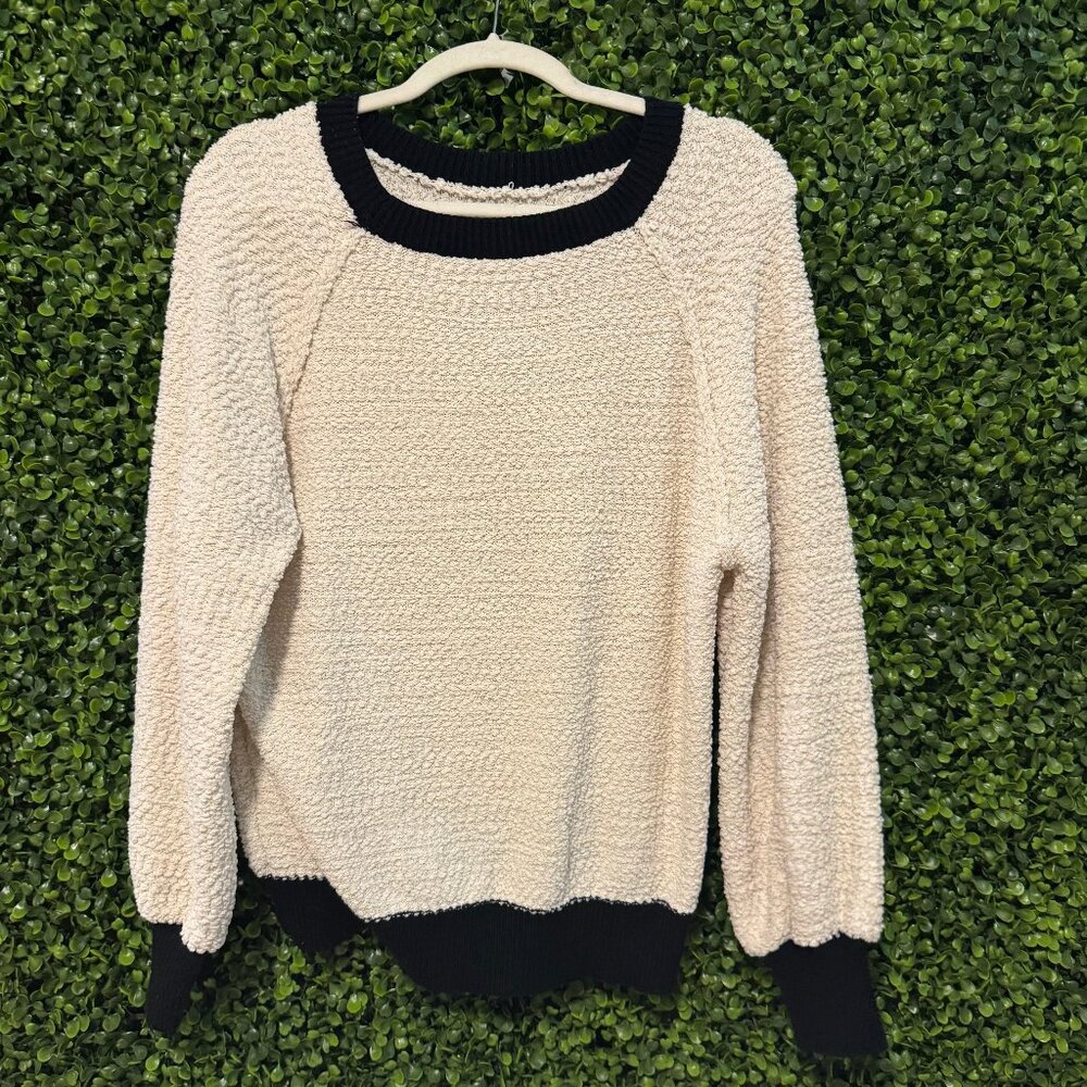 white sweater